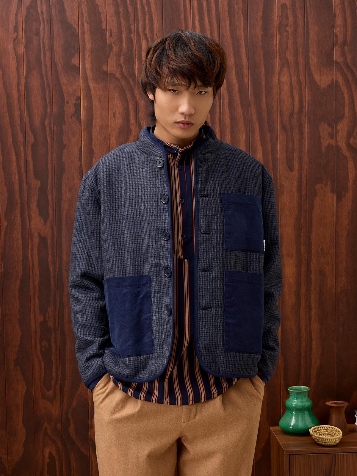 Model standing wearing JOSEPH & JAMES clothing